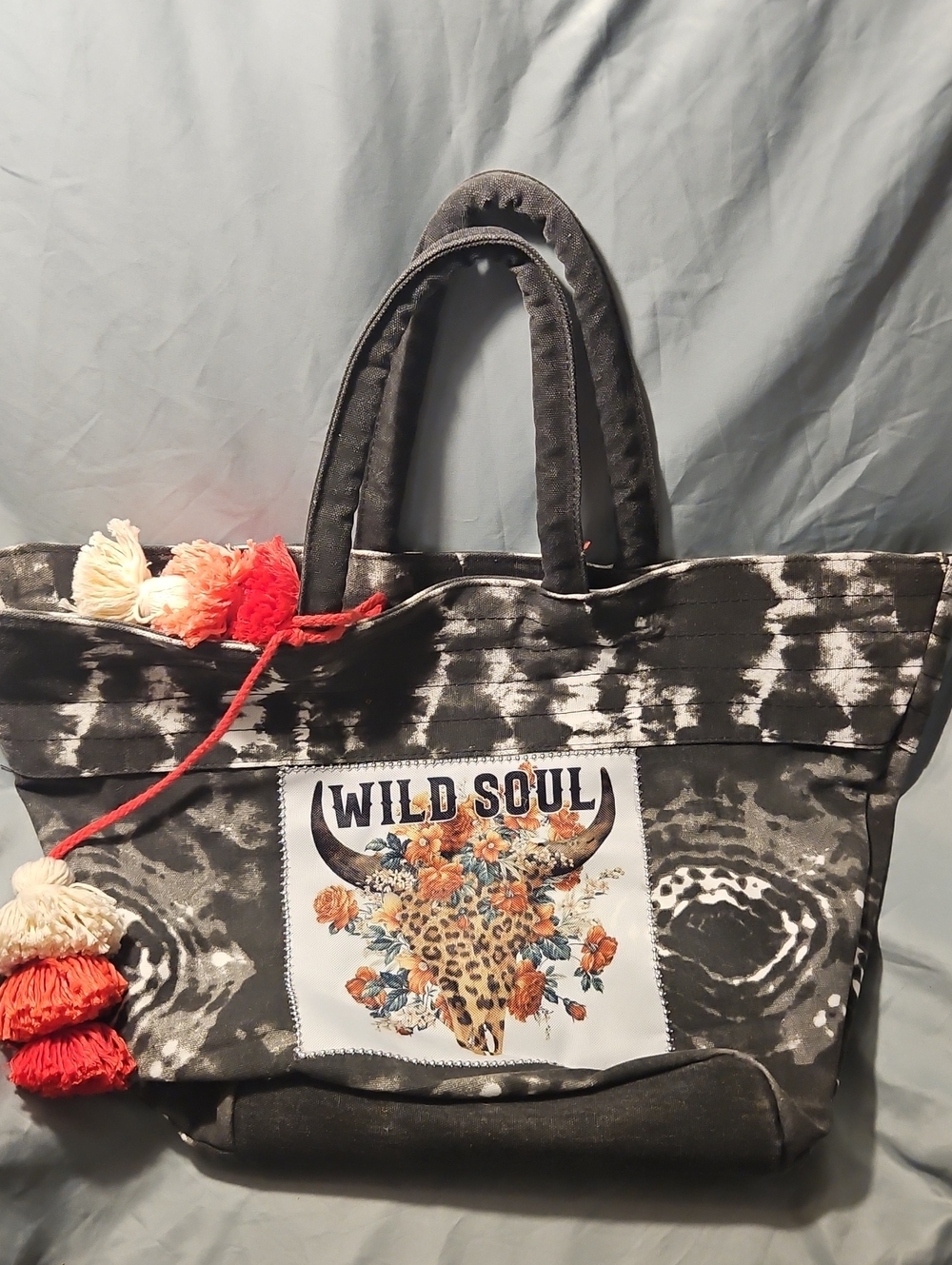 Hand Crafted Black Tie-Dye Tote with Floral Skull Patch and Red Tassels